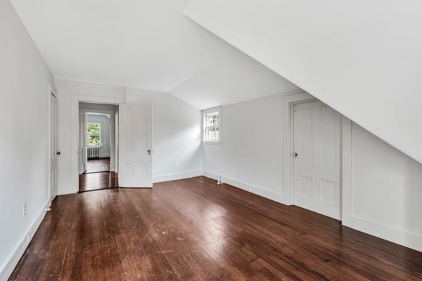 81 Fearing Road Hingham, MA 02043 - Photo 37 of 42 an empty room with wooden floor and windows