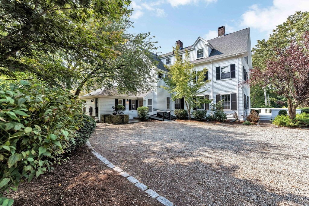 81 Fearing Road Hingham, MA 02043 - Photo 4 of 42 a view of a street with a house