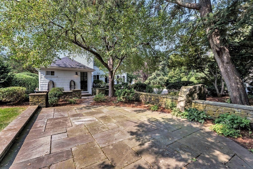 81 Fearing Road Hingham, MA 02043 - Photo 6 of 42 a white house that has a tree in front of it