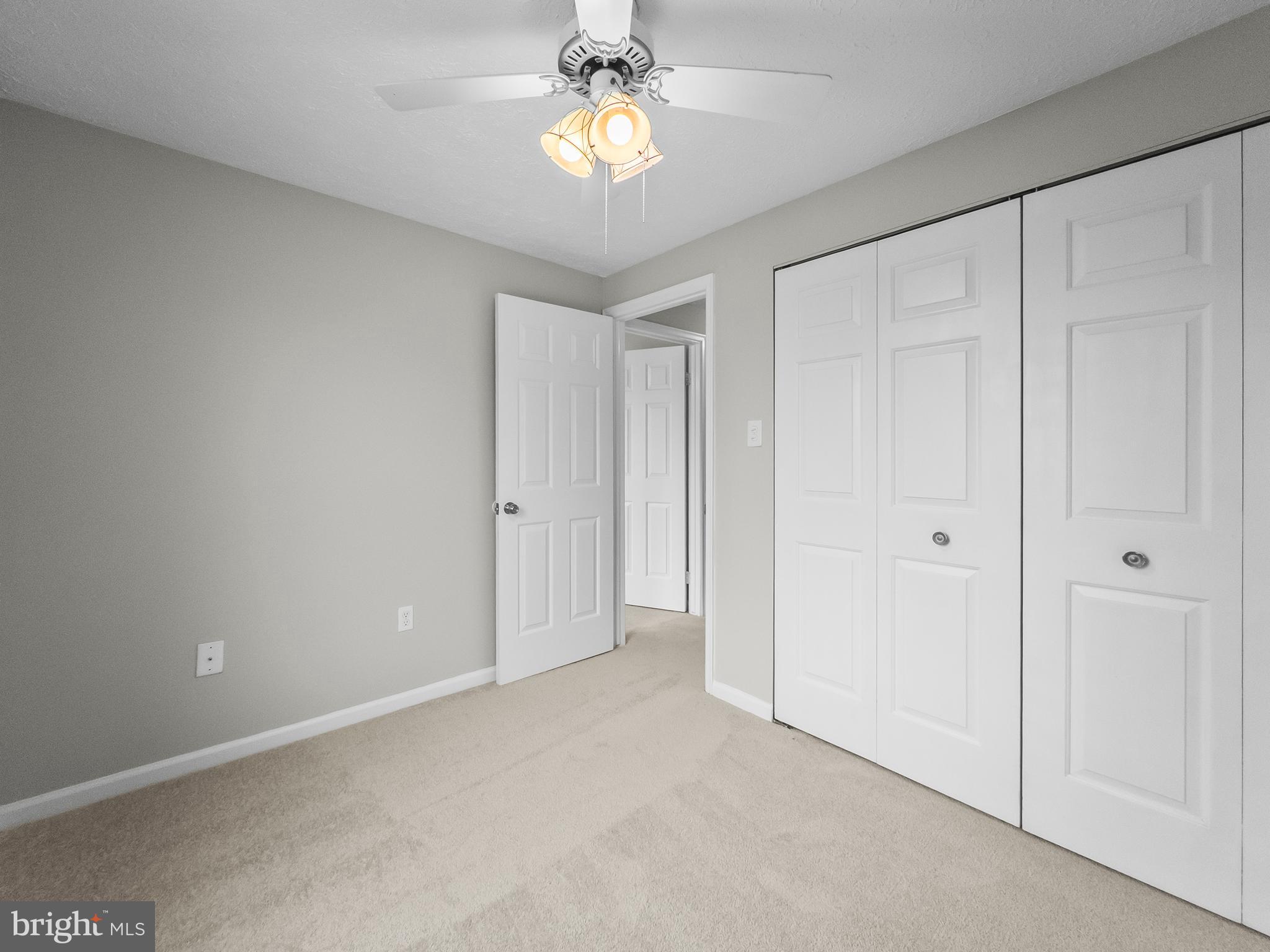 10110 Shelldrake Circle Damascus, MD 20872 - Photo 23 of 35 a view of an empty room and chandelier fan