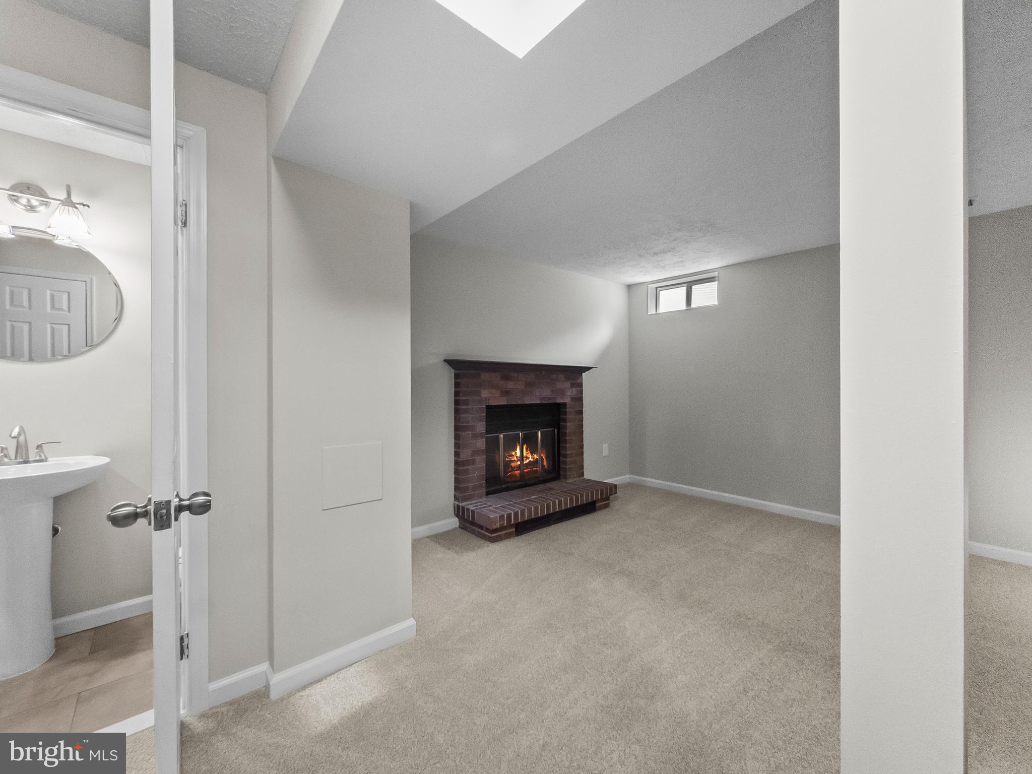 10110 Shelldrake Circle Damascus, MD 20872 - Photo 25 of 35 a view of an empty room and fire place