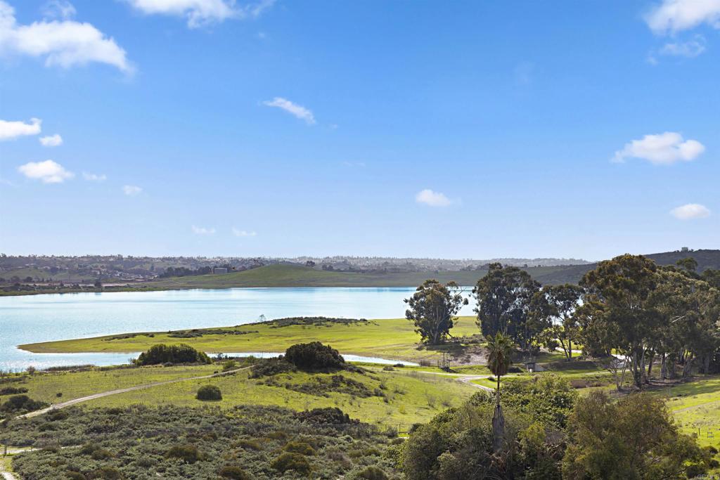 a view of a lake with an ocean beach