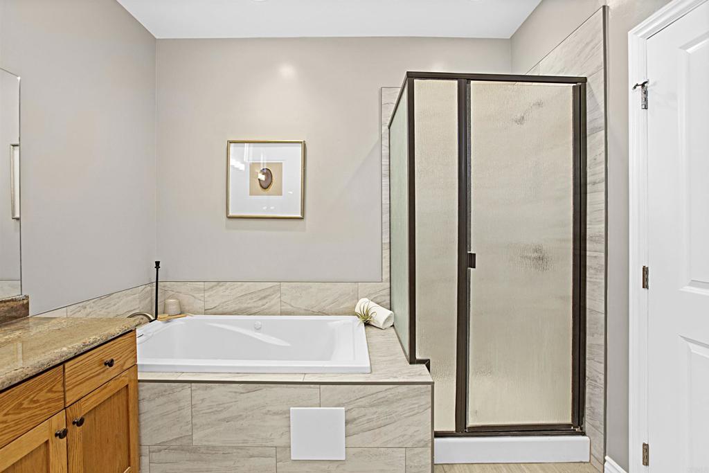 363 Maria Avenue Spring Valley, CA 91977 - Photo 14 of 19 a bathroom with a tub and a sink