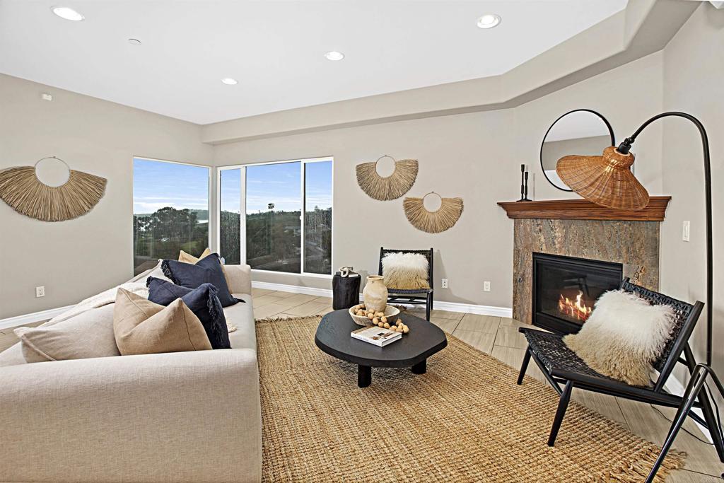 363 Maria Avenue Spring Valley, CA 91977 - Photo 5 of 19 a living room with furniture and a fireplace