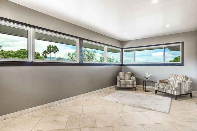 a room with furniture and window