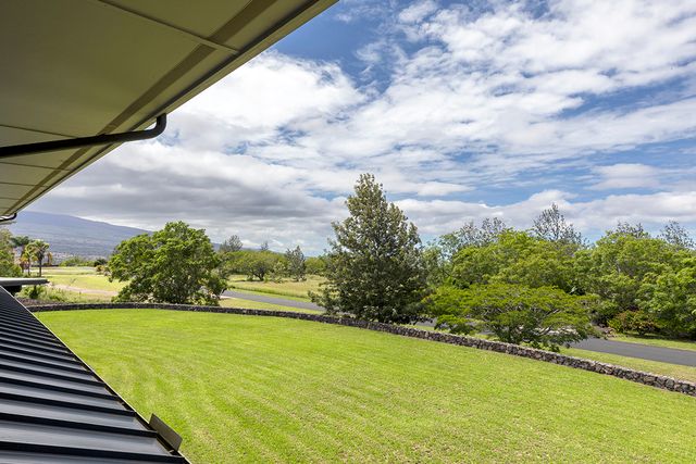 a view of a yard with an outdoor space