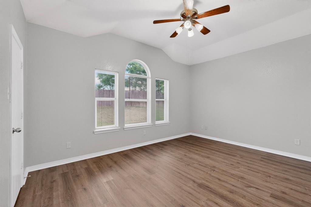 3401 Newgate Street Midlothian, TX 76065 - Photo 21 of 34 Spacious room featuring wood-finish flooring, light grey walls, and a recessed ceiling with a ceiling fan