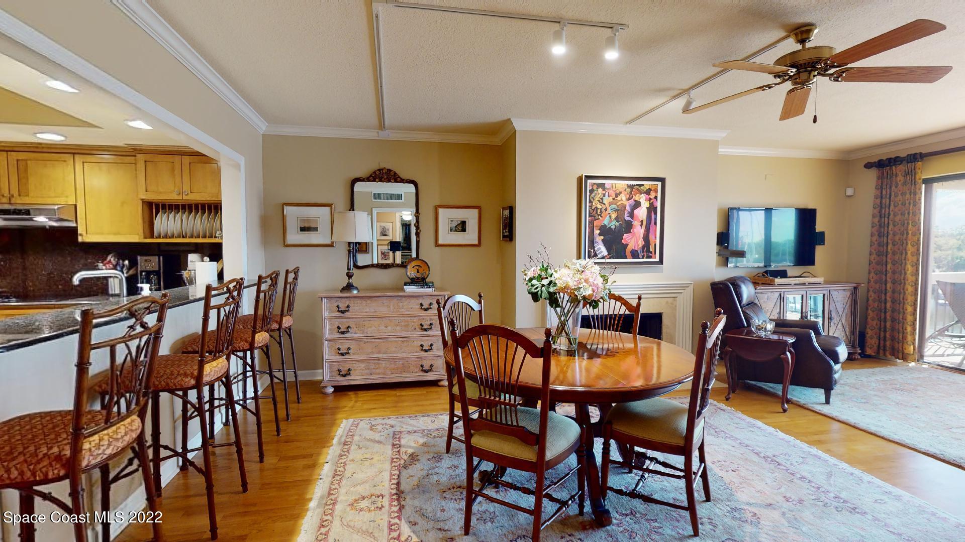 2220 Front Street, Unit 303 Melbourne, FL 32901 - Photo 11 of 29 a dining room with furniture and window