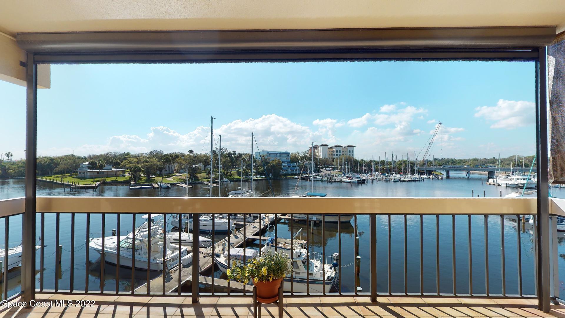 2220 Front Street, Unit 303 Melbourne, FL 32901 - Photo 28 of 29 a view of swimming pool with outdoor seating and city view