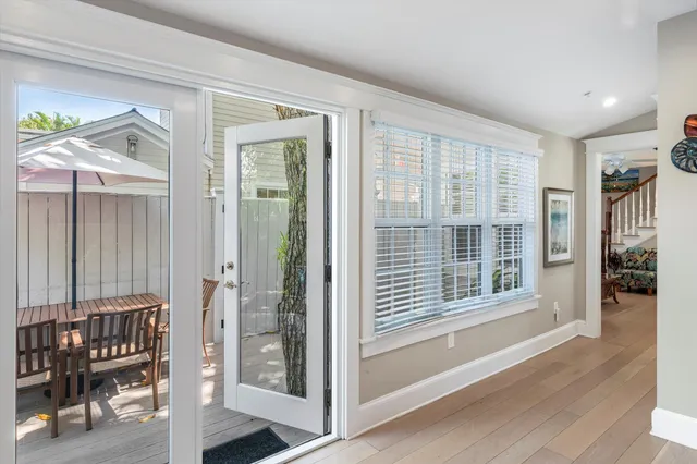 workspace with wooden floor and windows