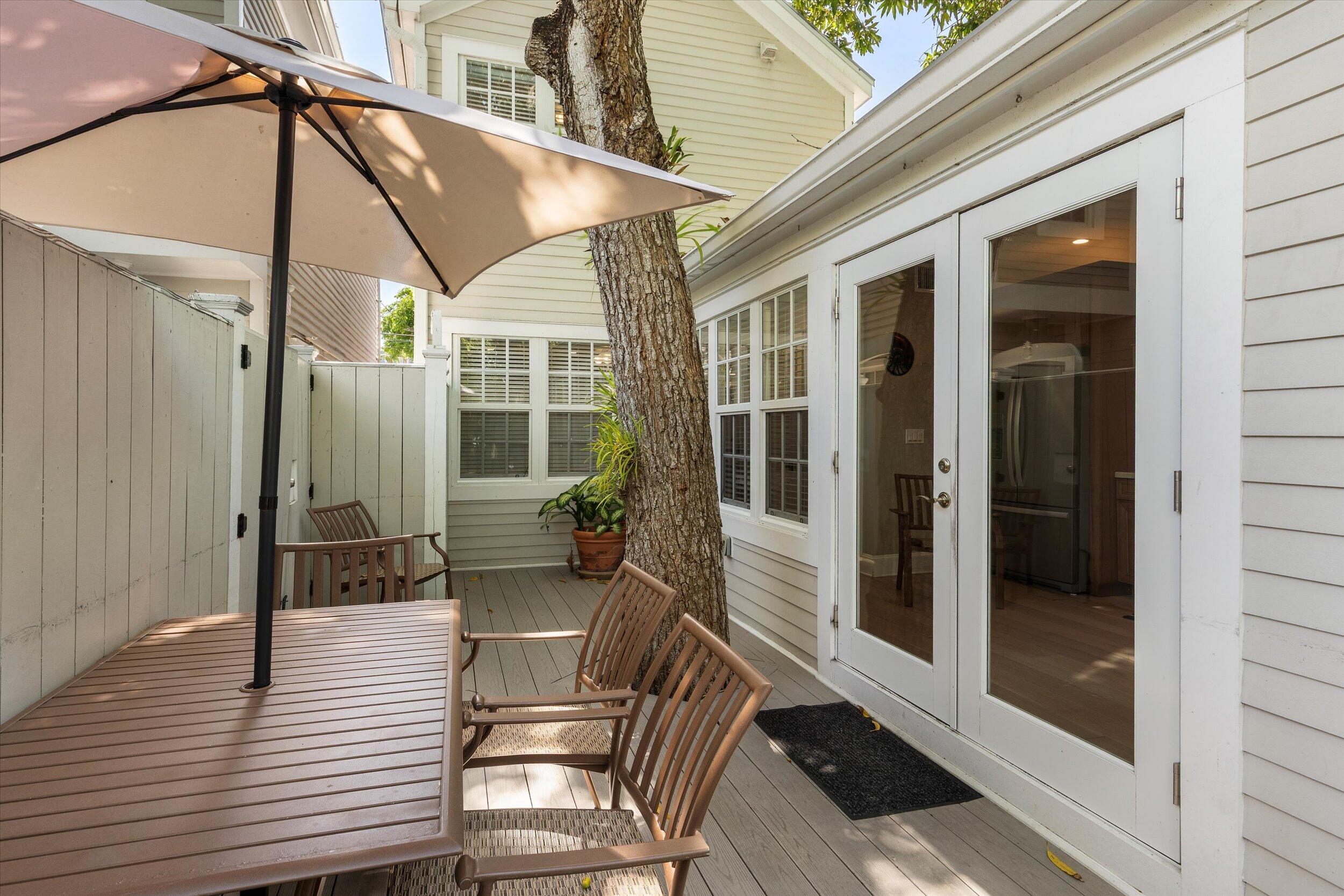 421-423 Simonton Street Key West, FL 33040 - Photo 21 of 37 a view of deck with patio