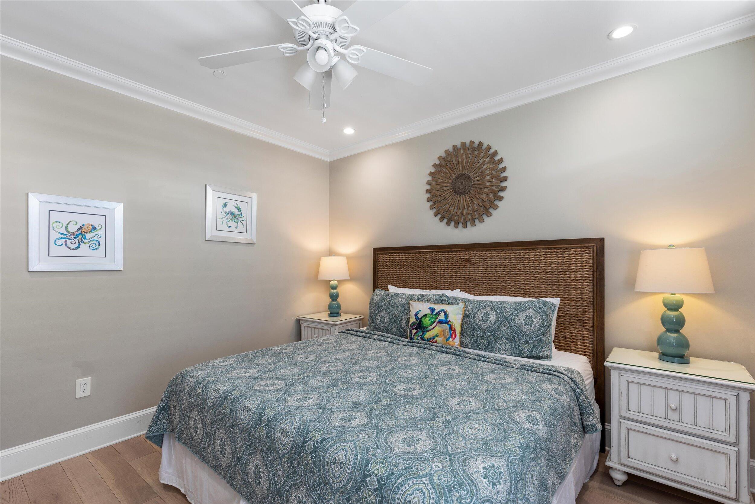 421-423 Simonton Street Key West, FL 33040 - Photo 26 of 37 a bedroom with a bed and a lamp on dresser