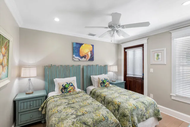 a bedroom with bed and window