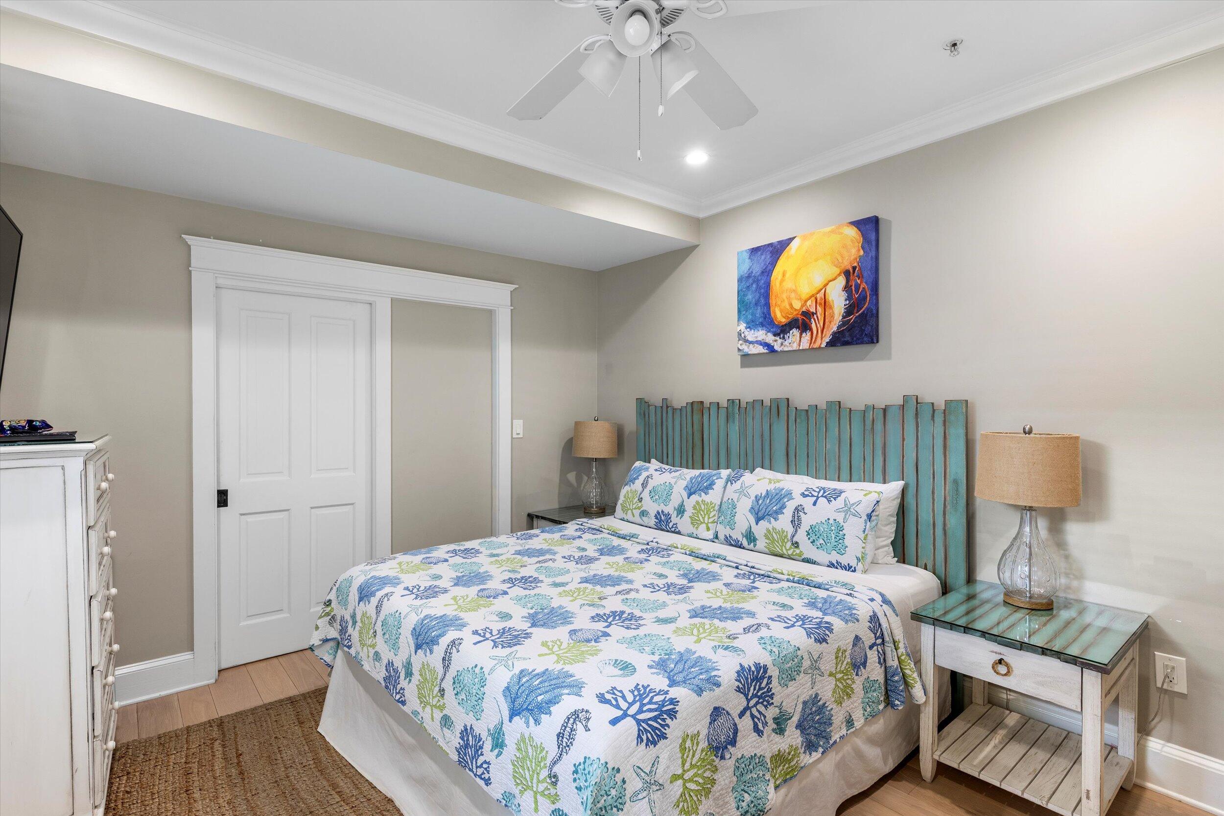 421-423 Simonton Street Key West, FL 33040 - Photo 7 of 37 a bedroom with a bed and a chandelier