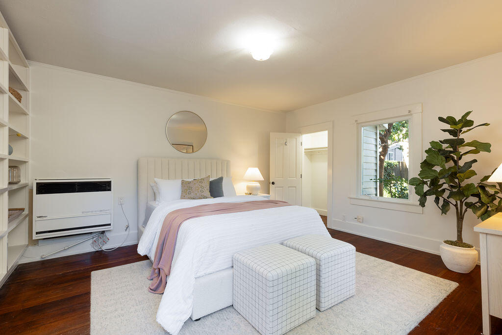 712 Castillo Street Santa Barbara, CA 93101 - Photo 13 of 28 a bedroom with a bed and a potted plant