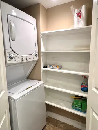 a utility room with washer and dryer