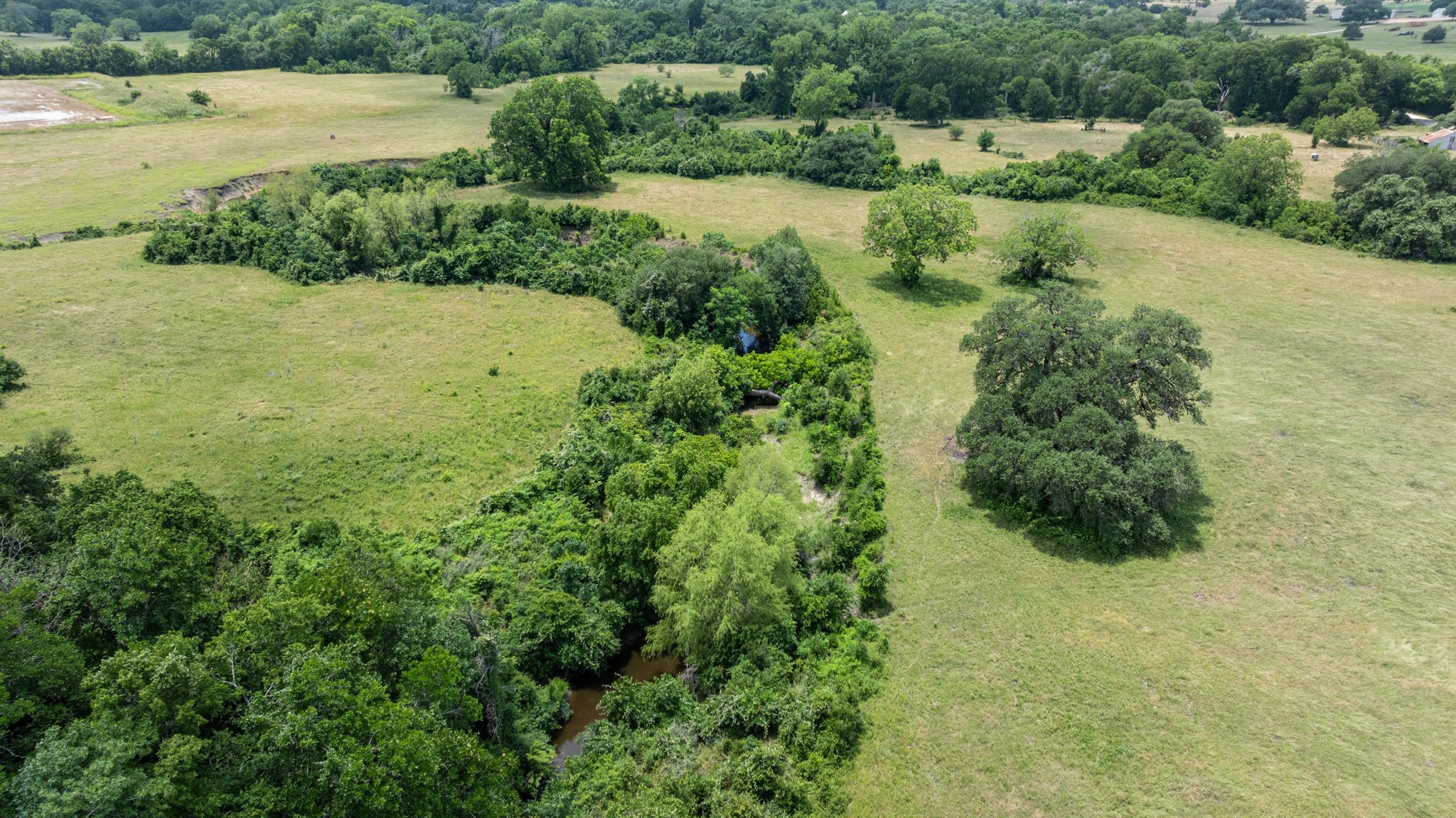 1268 Stokes Road Fayetteville, TX 78940 - Photo 5 of 21 a view of a lake with a yard