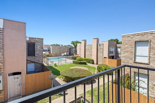 a view of a city from a balcony