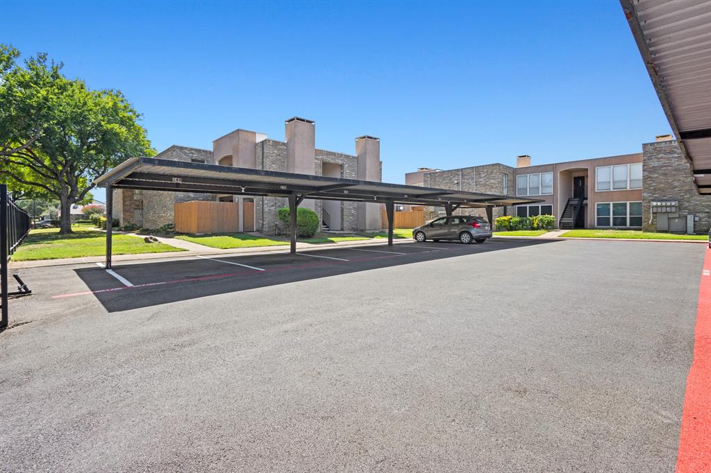 5634 Boca Raton Boulevard, Unit 209 Fort Worth, TX 76112 - Photo 23 of 24 View of partially covered parking lot