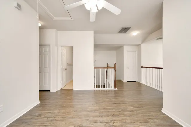 a view of entryway with wooden floor