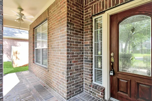 a view of a door and a window
