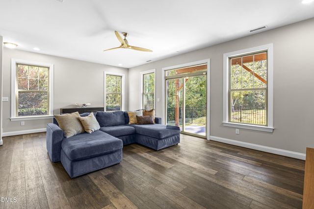 a bathroom with double sink and two mirror
