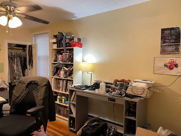 a view of a workspace with furniture