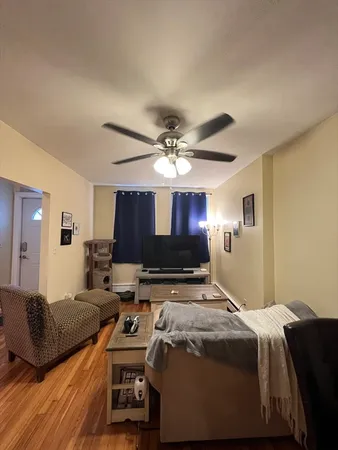 a bed room with bed and a window