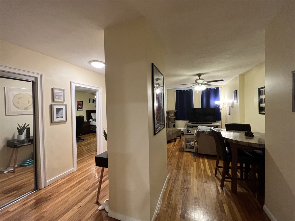 41 Cross Street Somerville, MA 02145 - Photo 31 of 42 a view of a living room and dining room