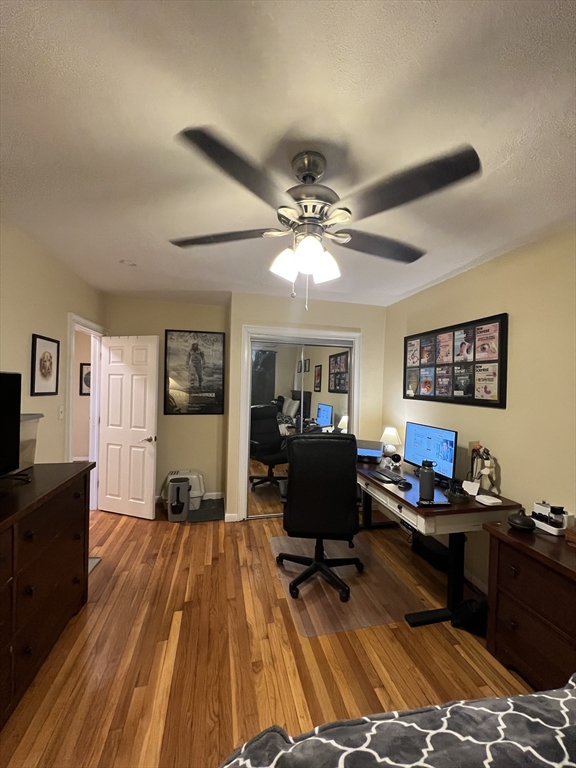 41 Cross Street Somerville, MA 02145 - Photo 10 of 42 a living room with furniture and wooden floor