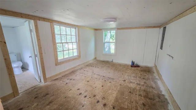 a view of empty room with front door