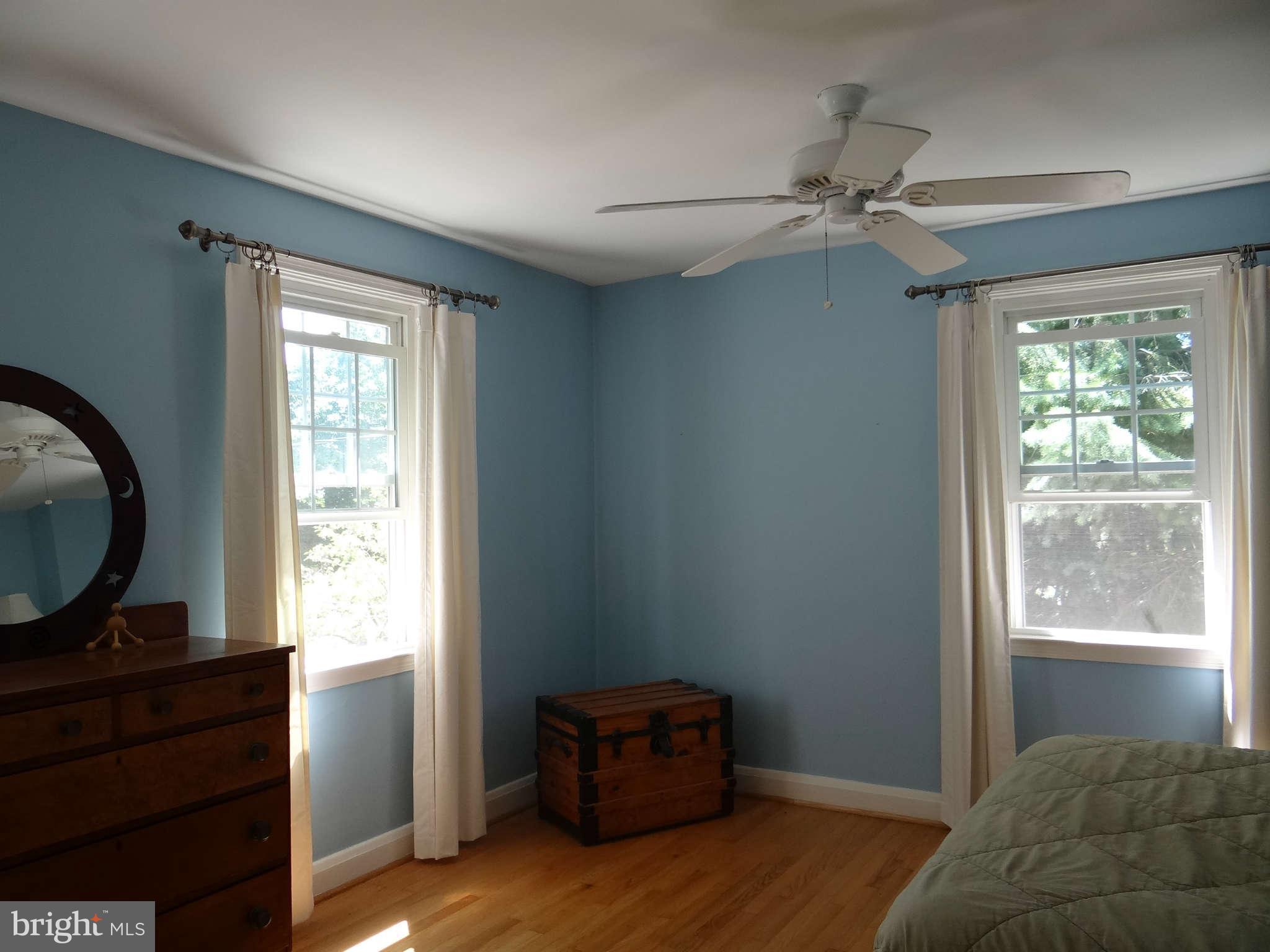 101 Stanmore Road Baltimore, MD 21212 - Photo 13 of 25 a living room with a bed furniture and a window