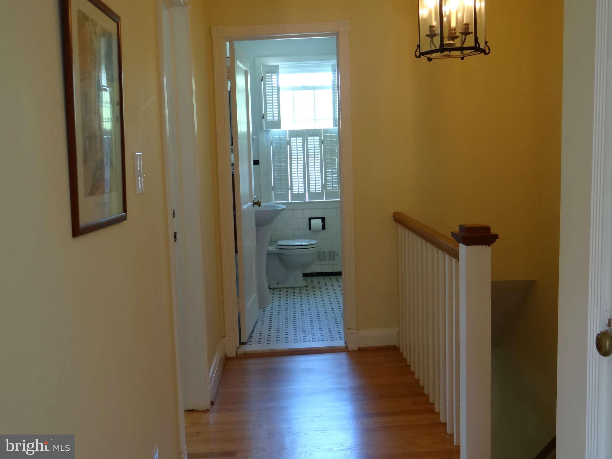 101 Stanmore Road Baltimore, MD 21212 - Photo 18 of 25 wooden floor in a gallery