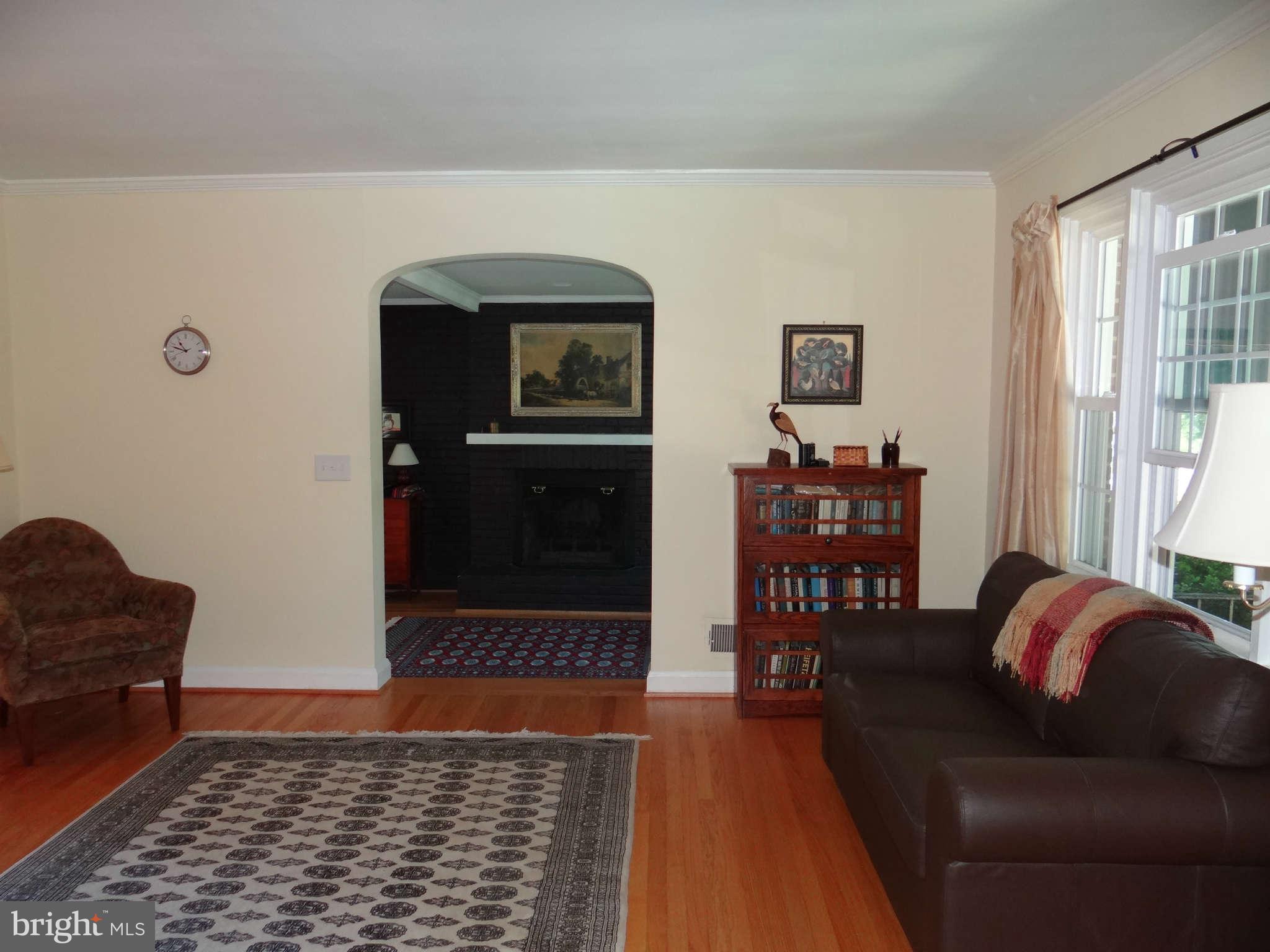 101 Stanmore Road Baltimore, MD 21212 - Photo 3 of 25 a living room with furniture and a rug