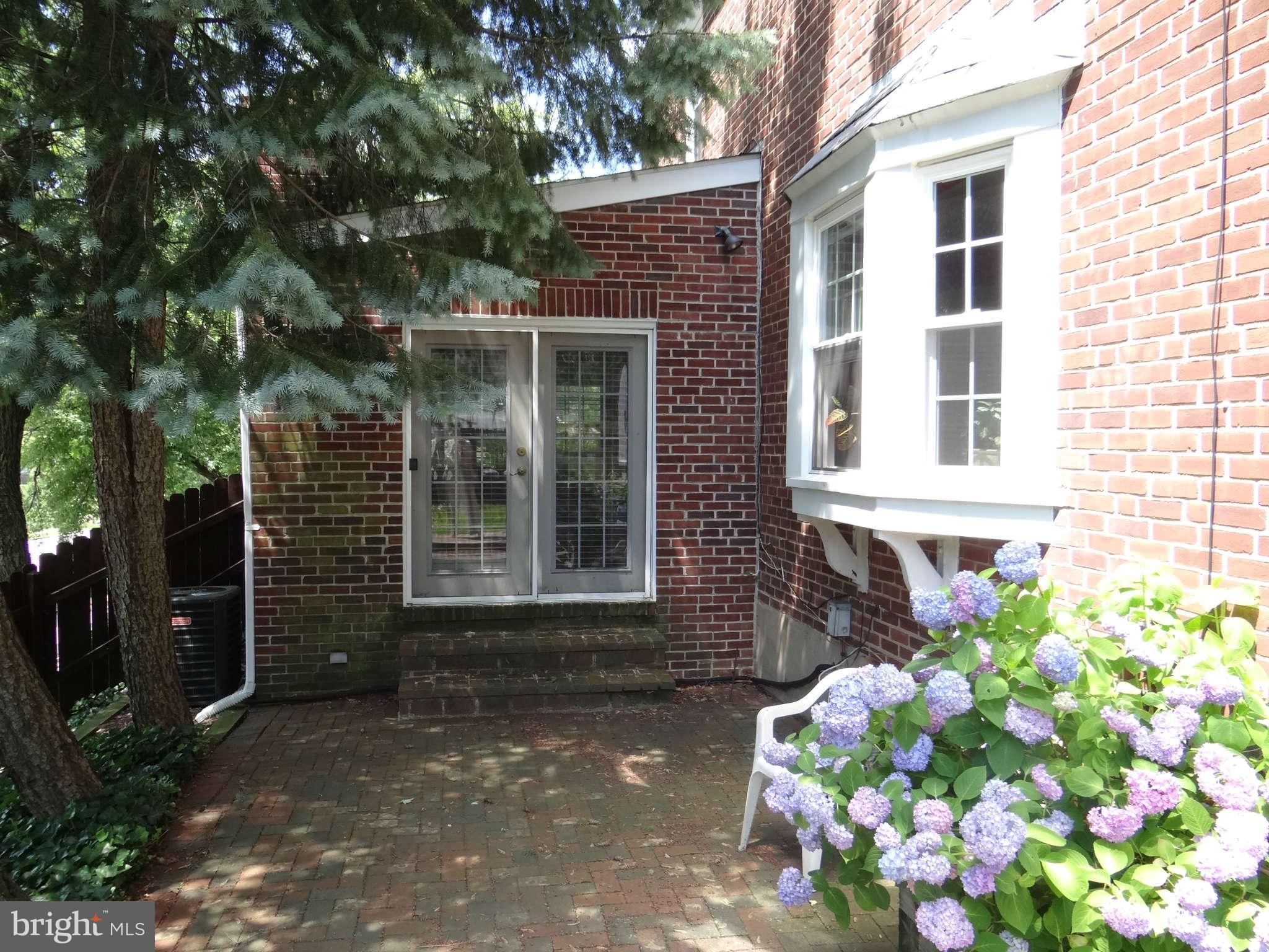 101 Stanmore Road Baltimore, MD 21212 - Photo 24 of 25 a front view of a house with a yard
