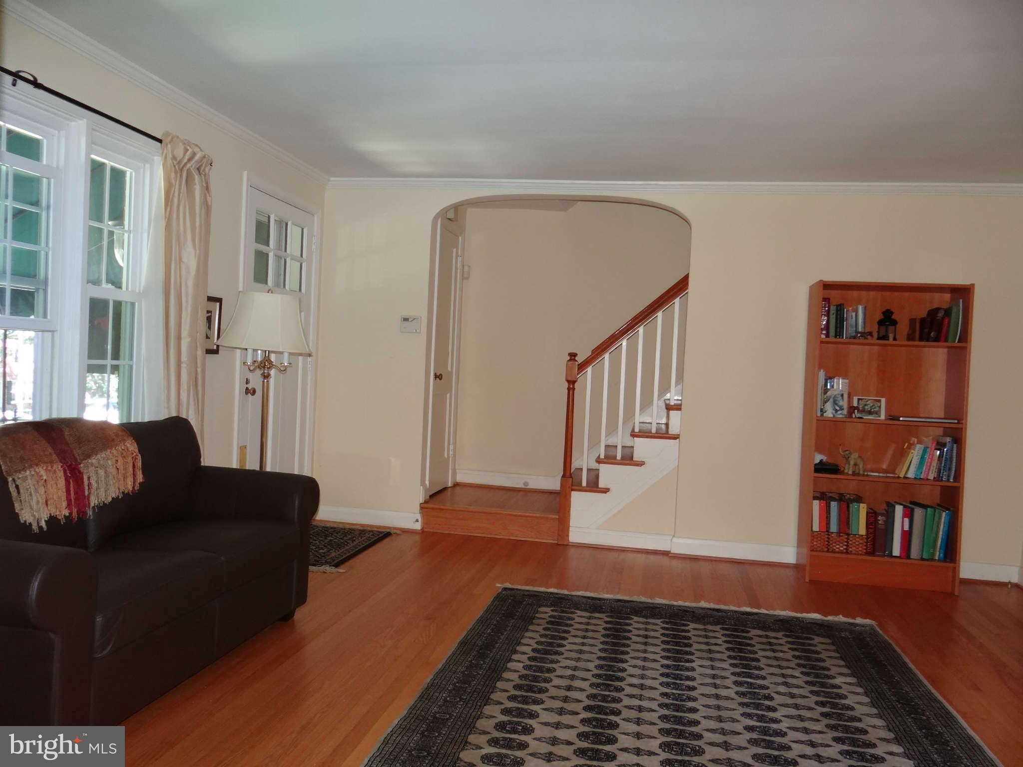101 Stanmore Road Baltimore, MD 21212 - Photo 4 of 25 a living room with furniture and wooden floor