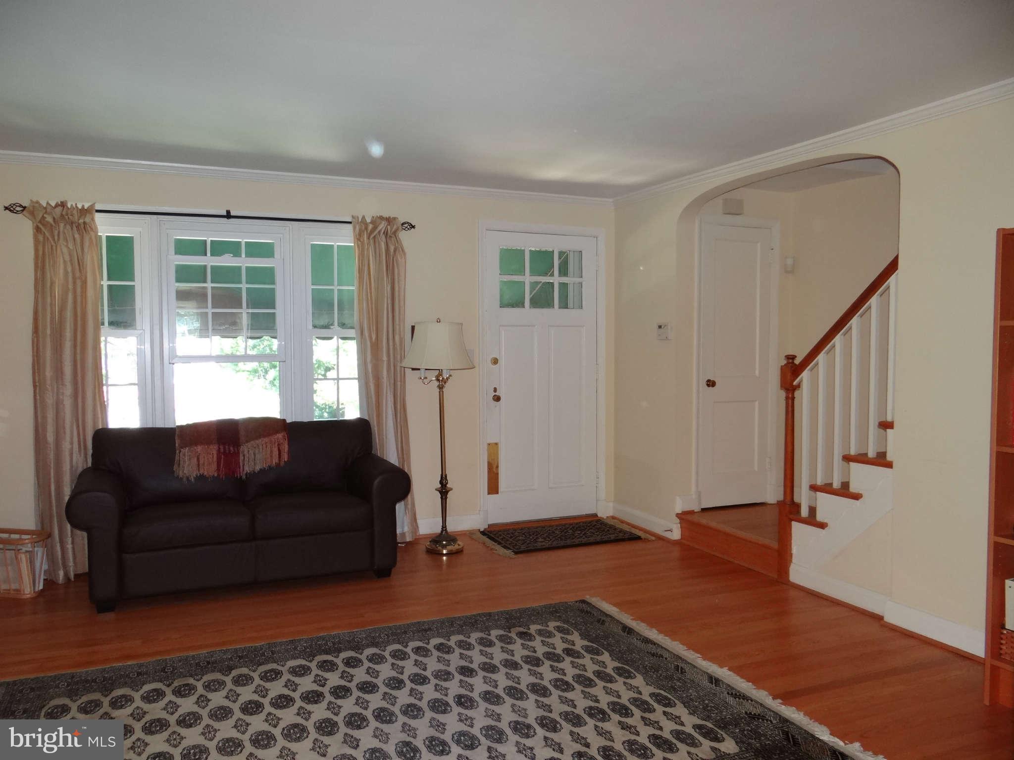 101 Stanmore Road Baltimore, MD 21212 - Photo 5 of 25 a living room with furniture and a window