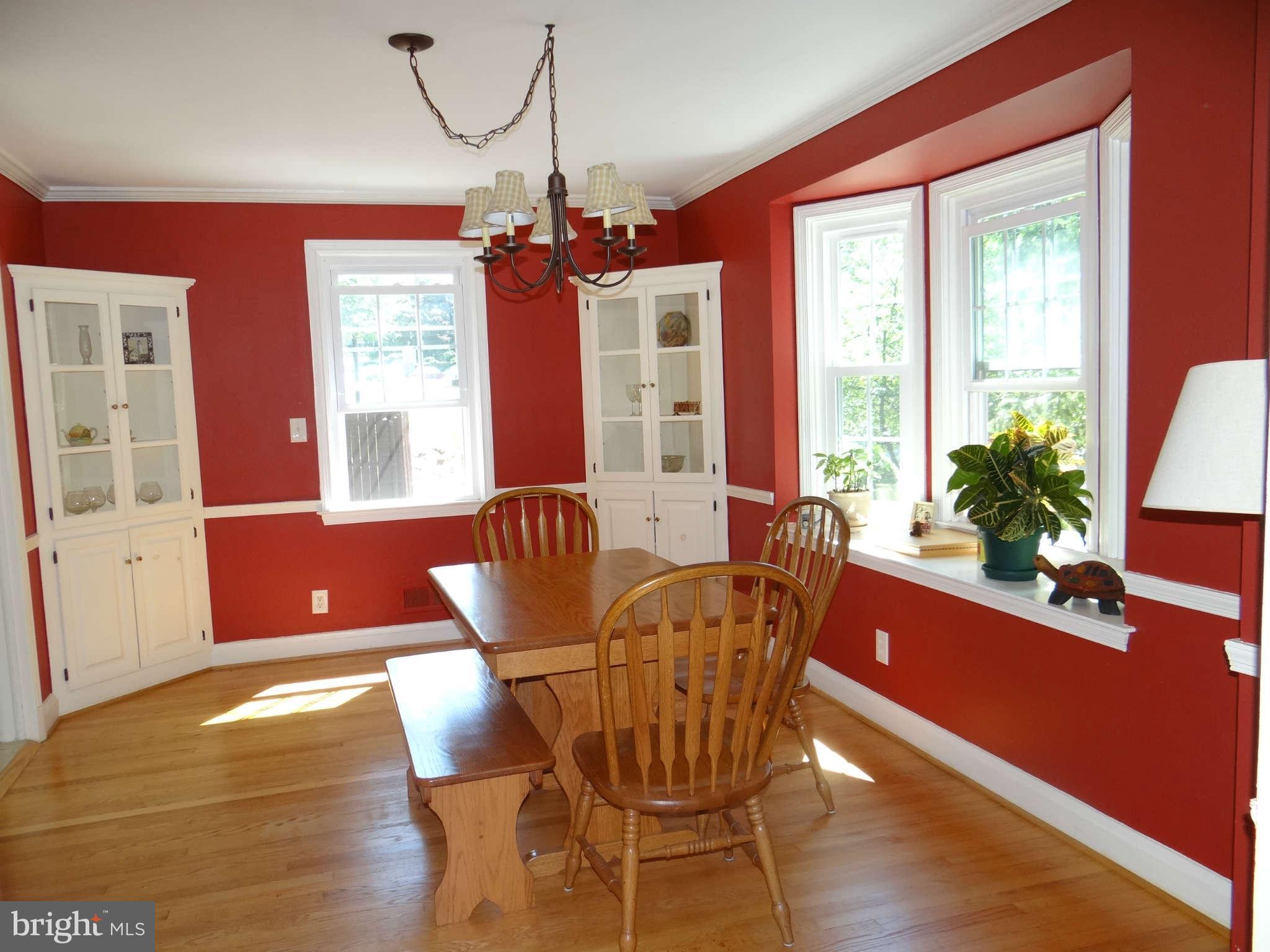 101 Stanmore Road Baltimore, MD 21212 - Photo 6 of 25 a view of a dining room with furniture window and wooden floor