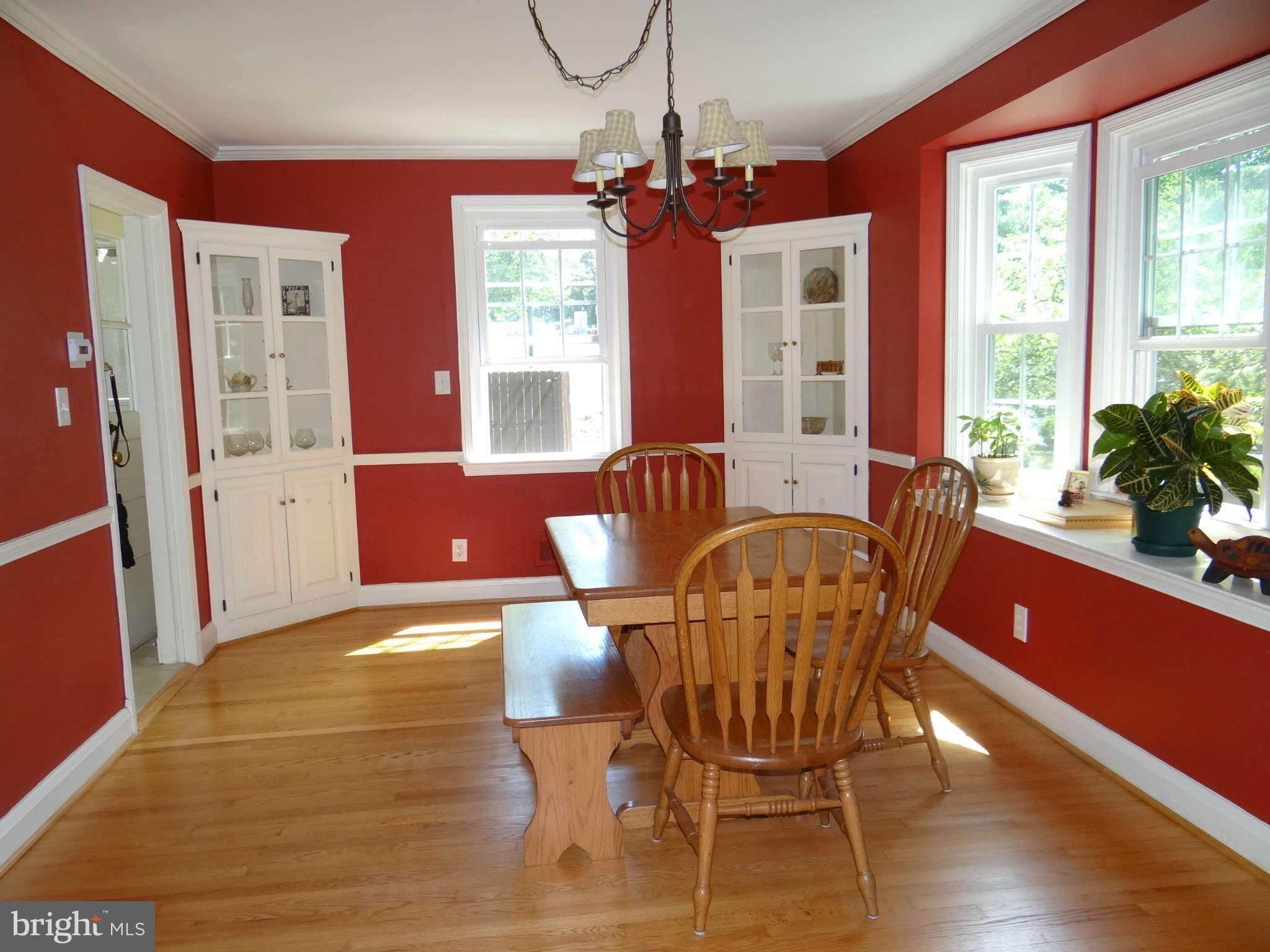 101 Stanmore Road Baltimore, MD 21212 - Photo 7 of 25 a view of a dining room with furniture window and wooden floor