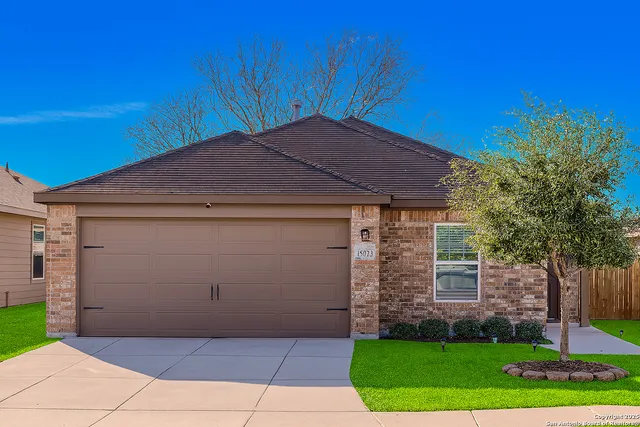 a view of backyard with green space
