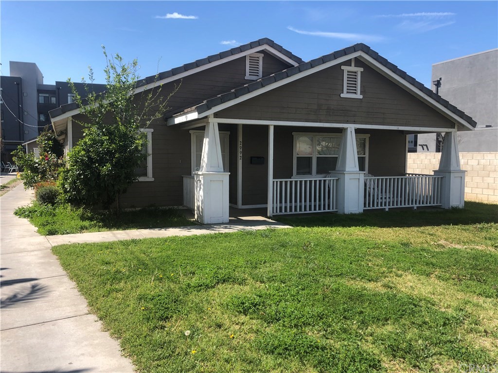 2992 Mission Inn Avenue Riverside, CA 92507 - Photo 1 of 1 a front view of a house with garden