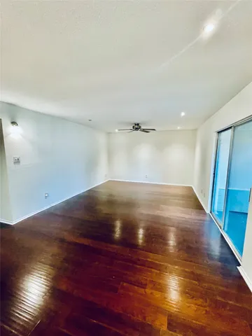 a bathroom with a tub a sink and a shower