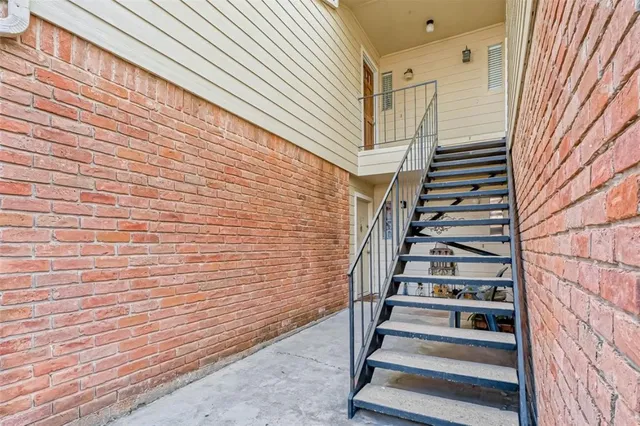 a kitchen with stainless steel appliances granite countertop a refrigerator sink and cabinets