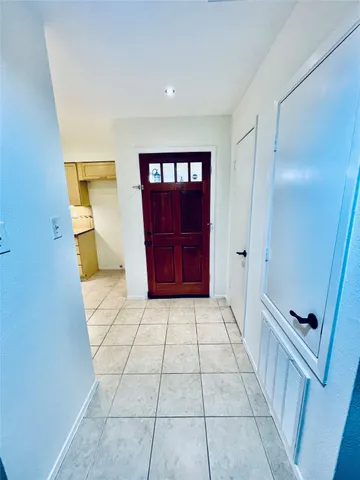 a kitchen with stainless steel appliances a stove a sink and a refrigerator