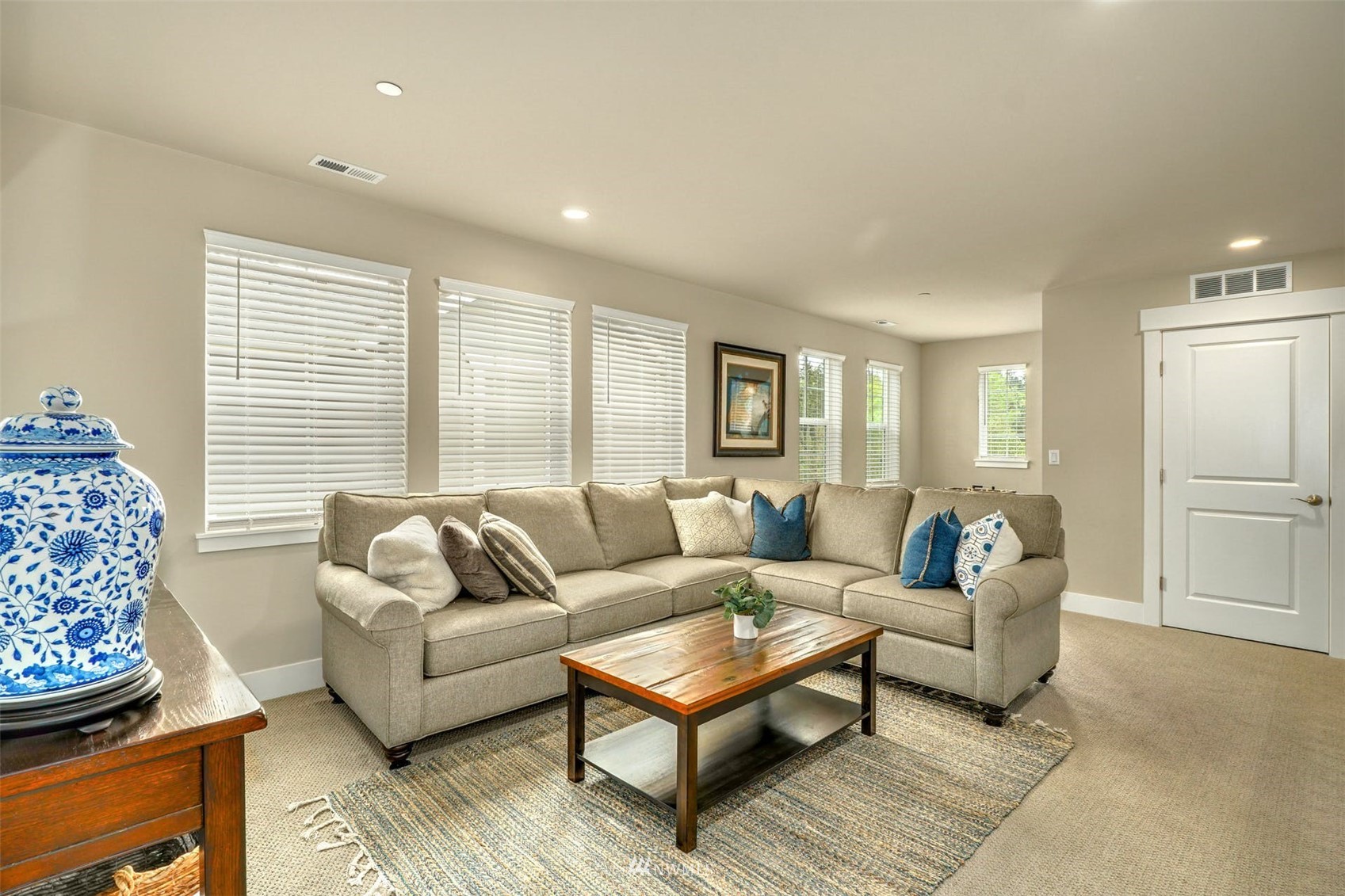 3312 238th Place Southeast Bothell, WA 98021 - Photo 20 of 40 a living room with furniture and a large window