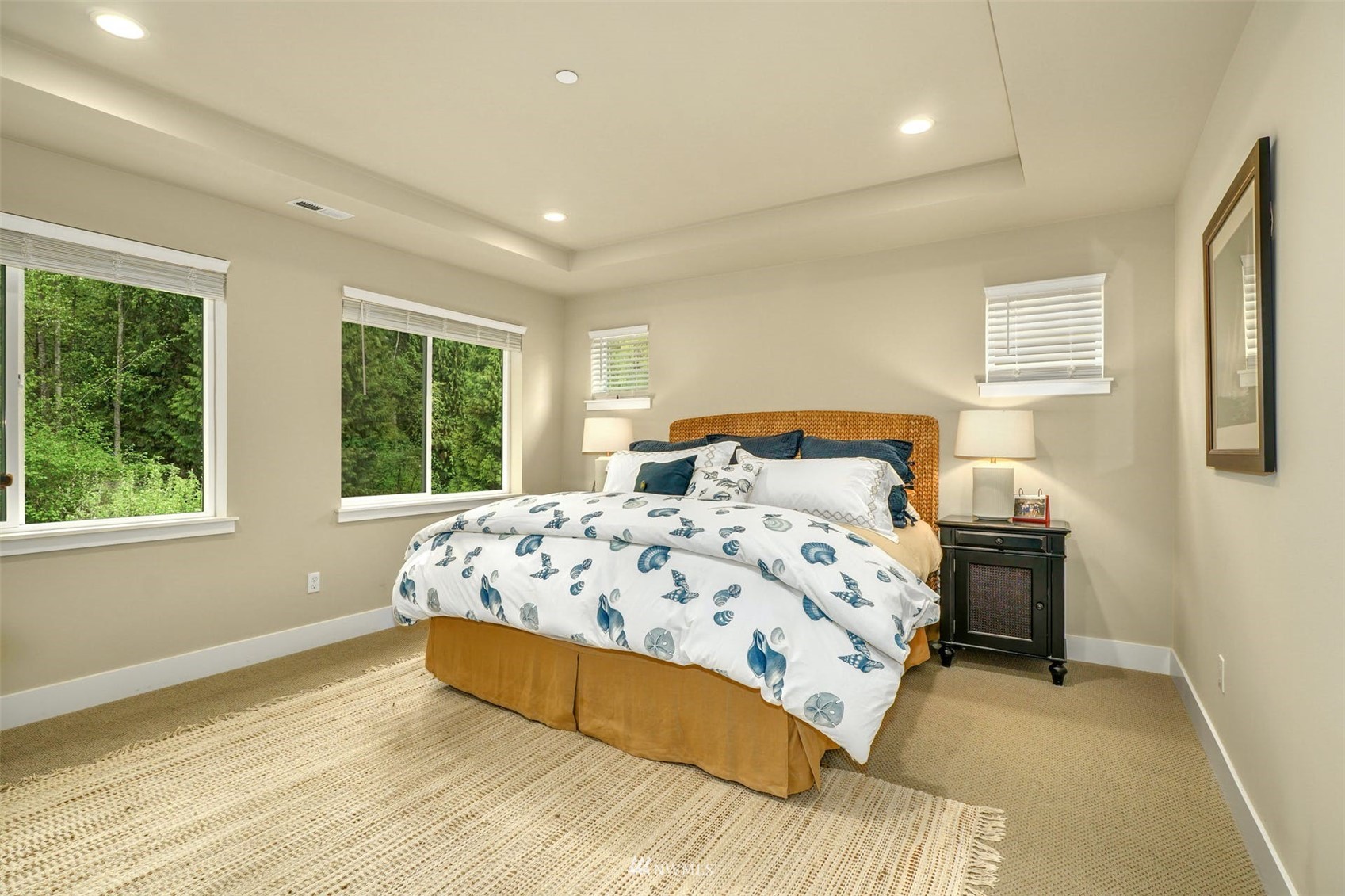 3312 238th Place Southeast Bothell, WA 98021 - Photo 21 of 40 a bedroom with a large bed and a window
