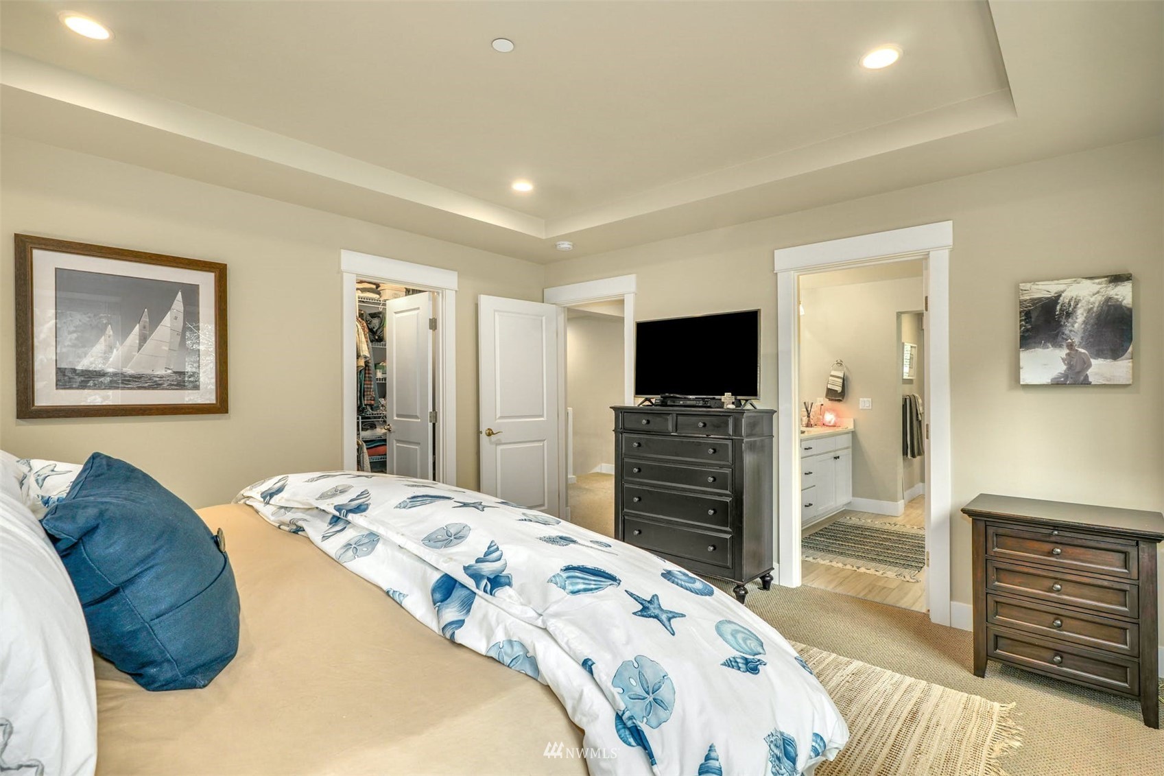 3312 238th Place Southeast Bothell, WA 98021 - Photo 23 of 40 a bedroom with a bed and a flat screen tv