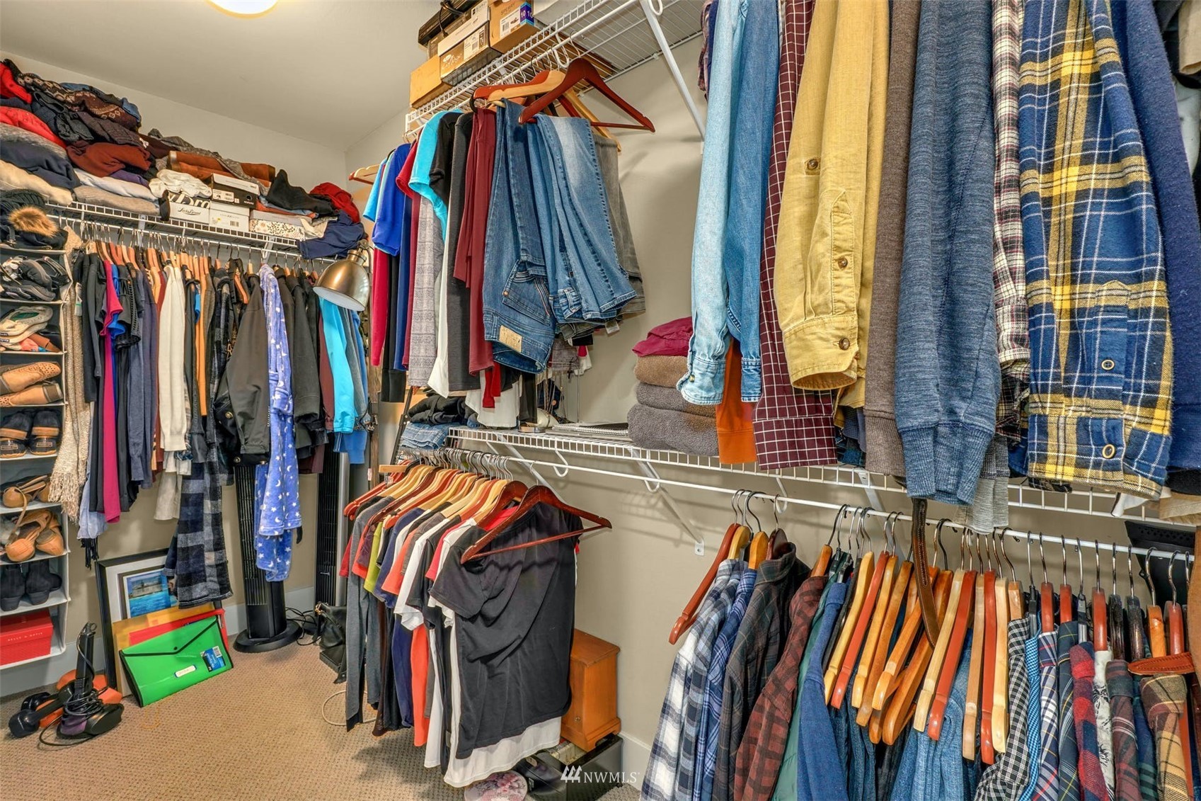 3312 238th Place Southeast Bothell, WA 98021 - Photo 26 of 40 a view of walk in closet with clothes and shoes