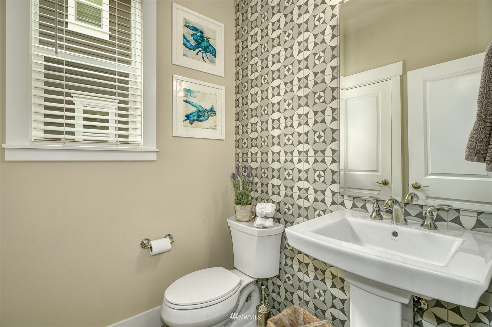 3312 238th Place Southeast Bothell, WA 98021 - Photo 30 of 40 a bathroom with a sink a toilet and a mirror