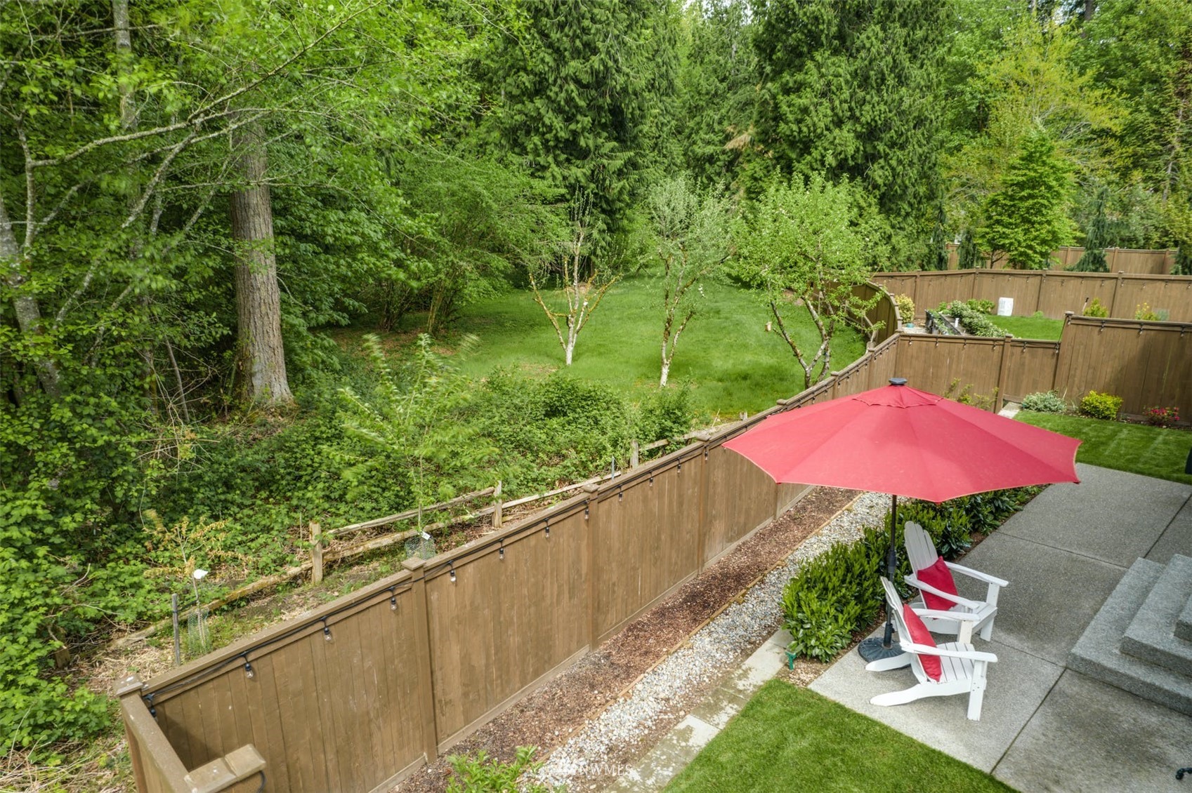 3312 238th Place Southeast Bothell, WA 98021 - Photo 35 of 40 a view of a backyard with sitting area